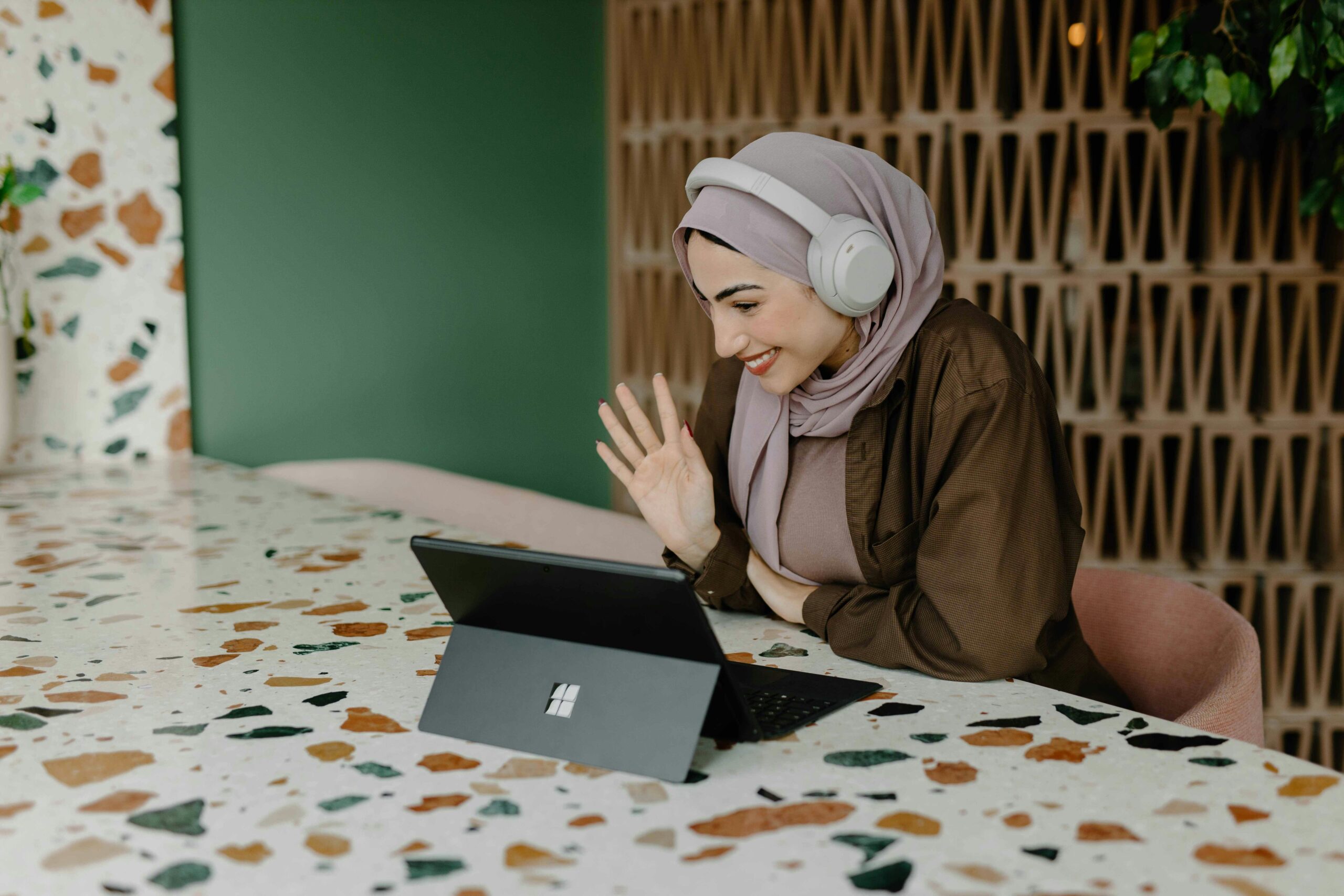 women smiling on Computer